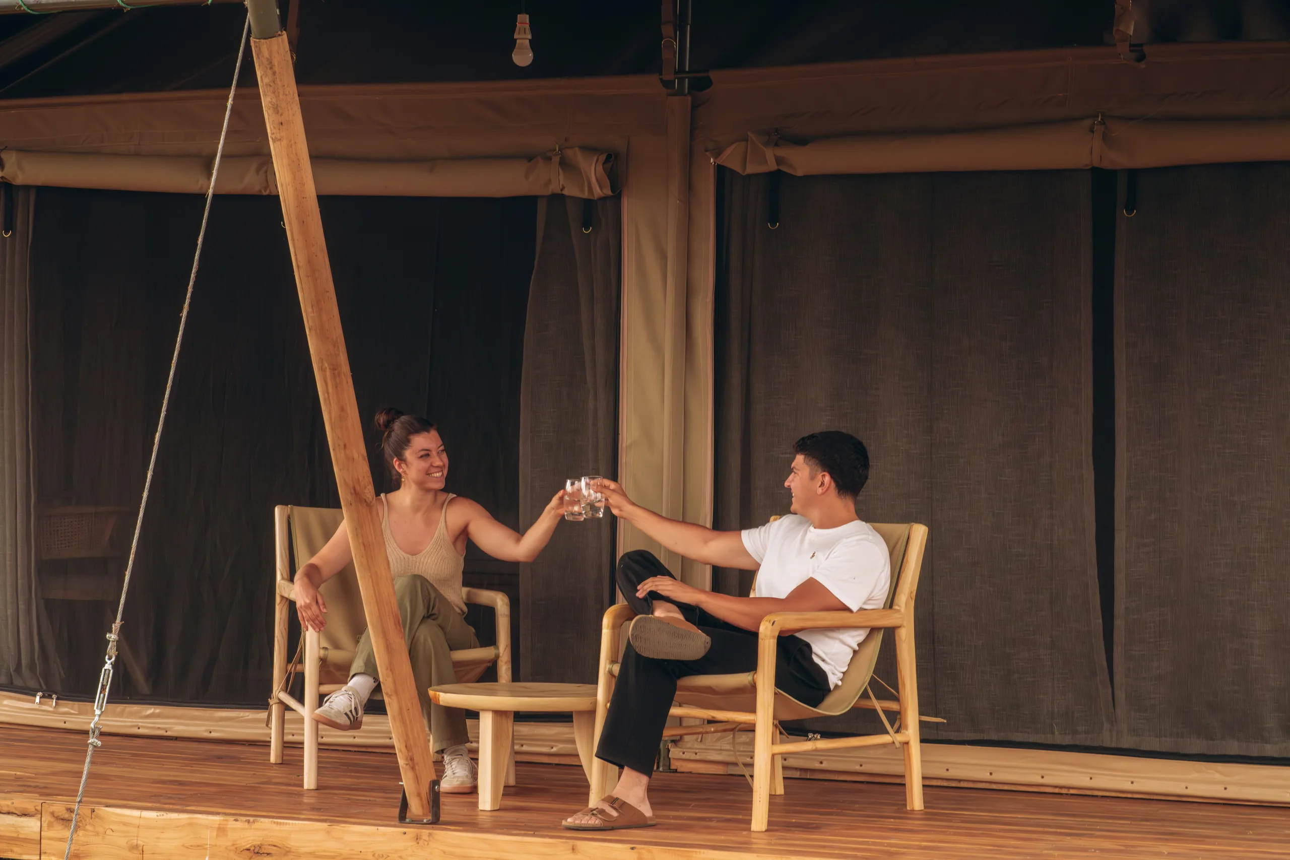 Guests relaxing at camp in the evening
